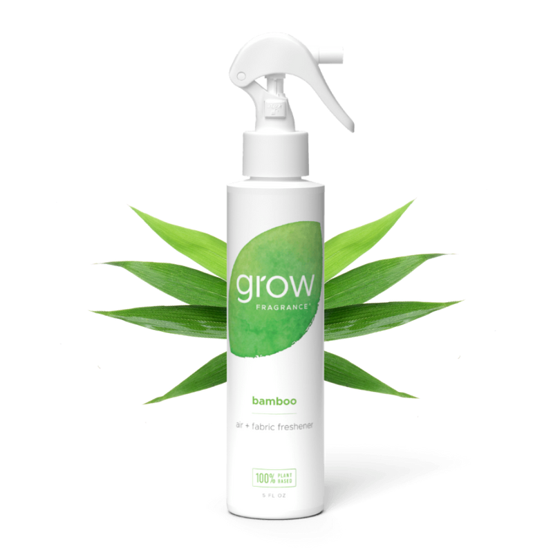 White spray bottle labeled 'grow Fragrance' with a green label on a white background