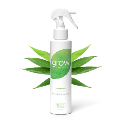 White spray bottle labeled 'grow Fragrance' with a green label on a white background