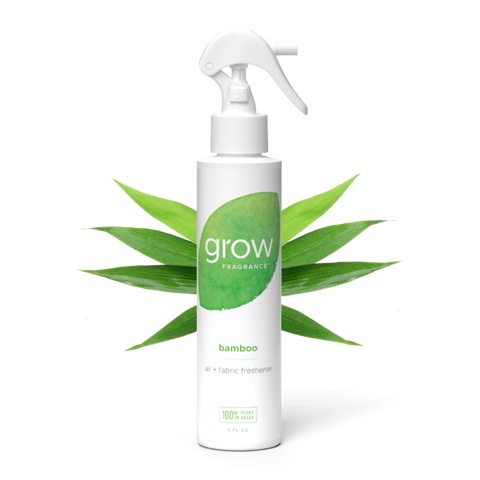 White spray bottle labeled 'grow Fragrance' with a green label on a white background