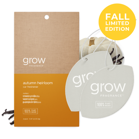 Grow Fragrance 'Autumn Heirloom' car freshener packaging with two oval-shaped hanging tags, a kraft paper box, and a yellow 'Fall Limited Edition' badge. The tags are cream and white with the brand name 'grow FRAGRANCE' printed in white. (featured)