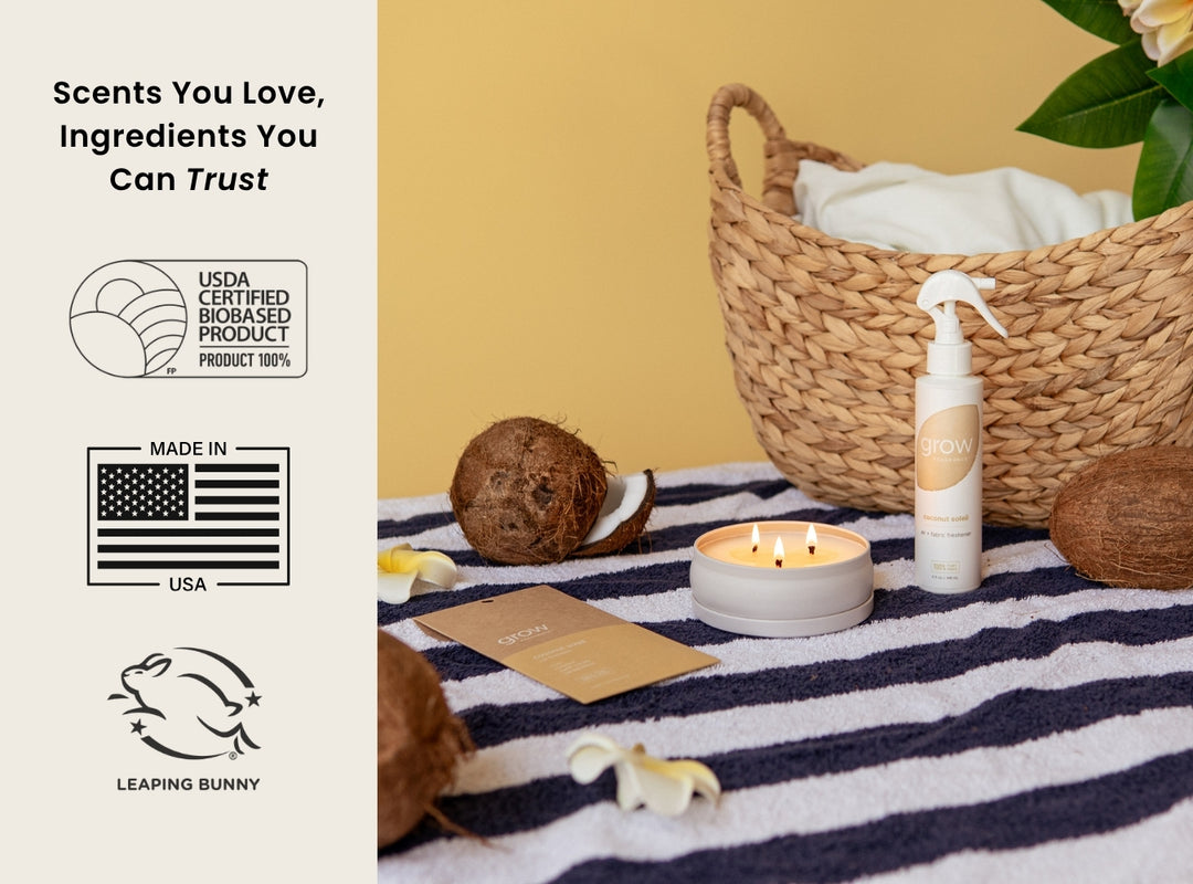 Product display with a candle, basket, and packaging on a striped surface, featuring certification logos on the left. Scents You Love, Ingredients You Can Trust / USDA Certified Biobased Product 100% / Made in USA / Leaping Bunny (featured)