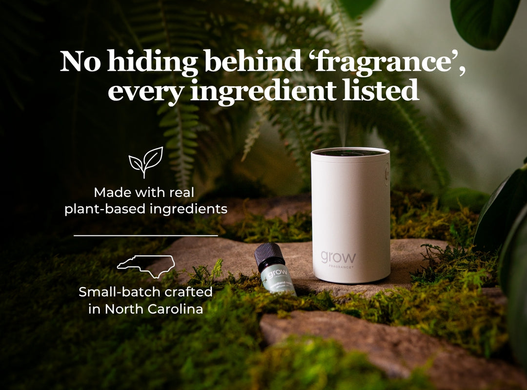 A white cylindrical diffuser labeled 'grow' sits on mossy rocks outdoors, with a small bottle beside it. Large text reads, 'No hiding behind 'fragrance', every ingredient listed,' with additional claims about plant-based ingredients and North Carolina craftsmanship. (featured)