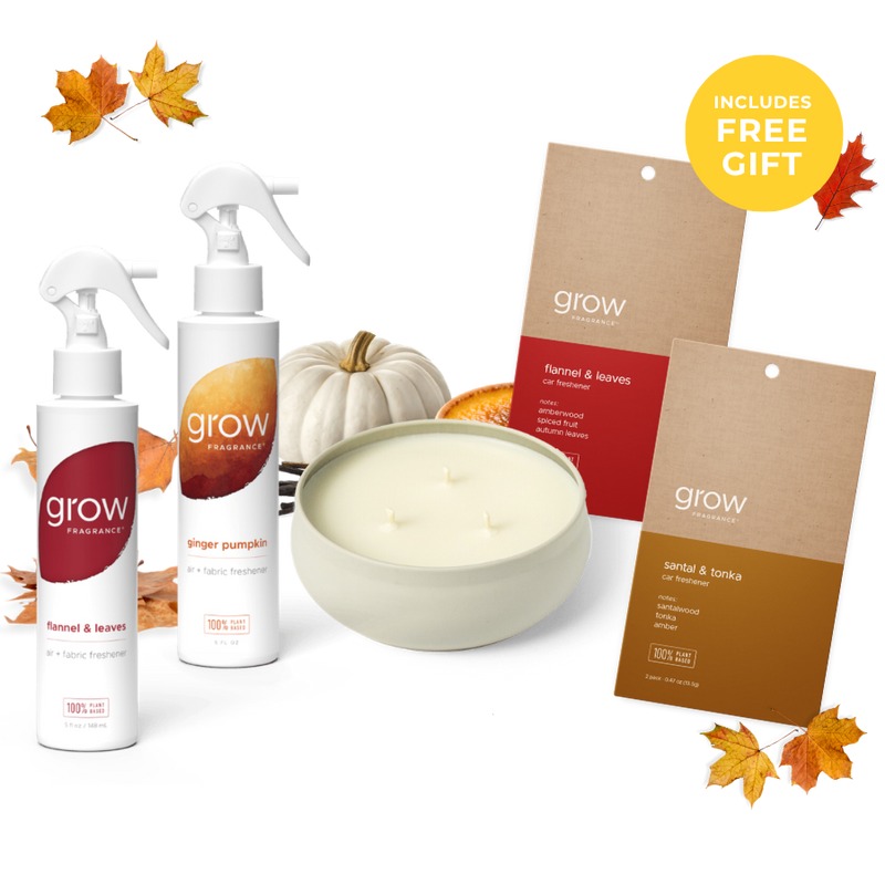 A fall-themed home fragrance gift set from grow Fragrance, featuring two ginger pumpkin spray bottles, a scented candle, two hanging scent cards, and autumn leaves on a white background with a yellow 'Includes Free Gift' badge. (featured)
