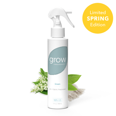 Linen grow fragrance bottle on white background with plant ingredients and limited edition spring yellow badge