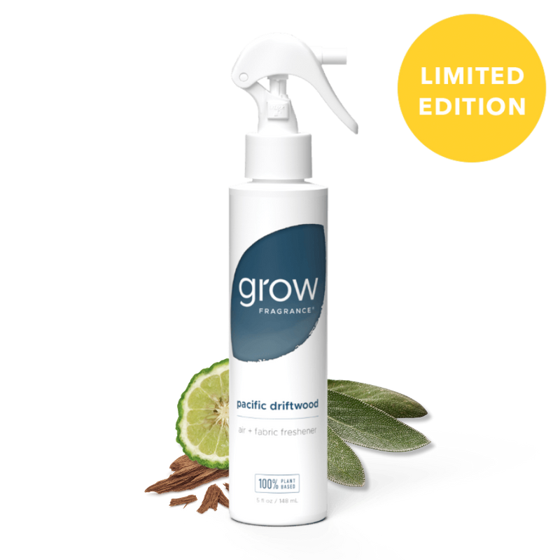 Pacific driftwood grow fragrance bottle on white background with plant ingredients