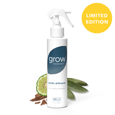 Pacific driftwood grow fragrance bottle on white background with plant ingredients