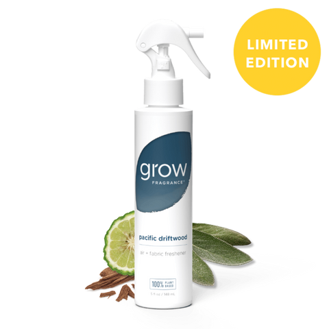 Pacific driftwood grow fragrance bottle on white background with plant ingredients