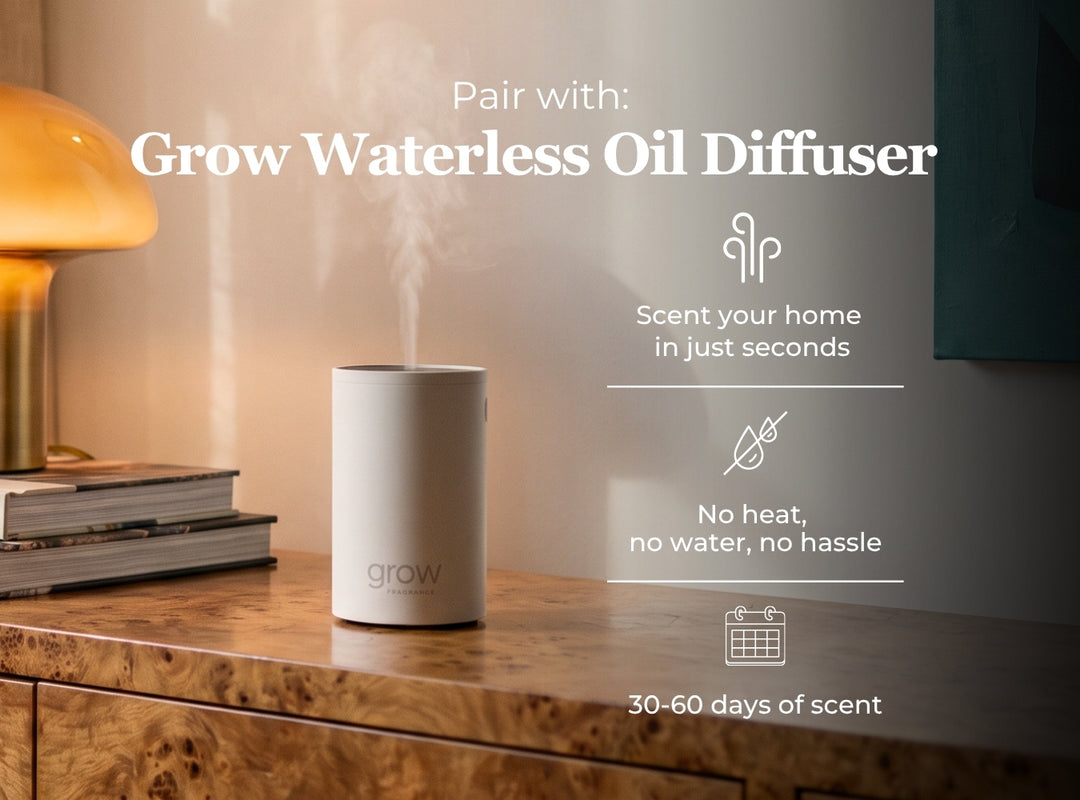 A cylindrical white Grow waterless oil diffuser sits on a wooden cabinet in a warmly lit room, with text overlays promoting its use to pair with oil diffusers and scent your home. (featured)
