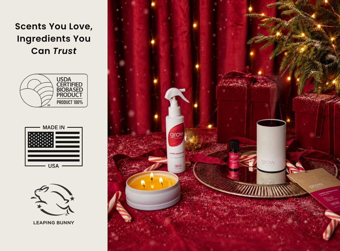 Product with a candle, candy canes, and a bottle labeled 'grow' on a white surface with red background. Vanilla Peppermint Air + Fabric Spray (featured)