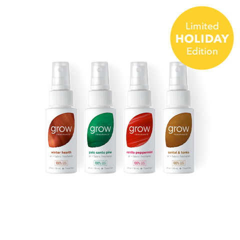 Four small grow fragrance spray bottles arranged in a row on a white background, with a yellow circular badge in the top right that reads 'Limited Holiday Edition.' The bottles have white sprayers and labels with different accent colors: brown, green, red, and brown/gold tones.