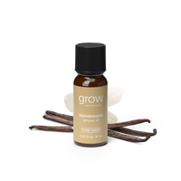 A small amber glass bottle of grow fragrance blondewood diffuser oil with a black cap and tan label, shown on a white background with vanilla beans and a yellow 'BEST SELLER' badge.