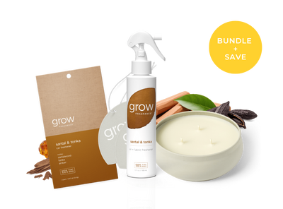 A product bundle from the brand 'grow' featuring a 'sandal & tonka' scented oil diffuser, a matching spray bottle, a 'sandal & tonka' candle, and a brown kraft paper hang tag, arranged on a white background with a yellow 'BUNDLE + SAVE' badge.